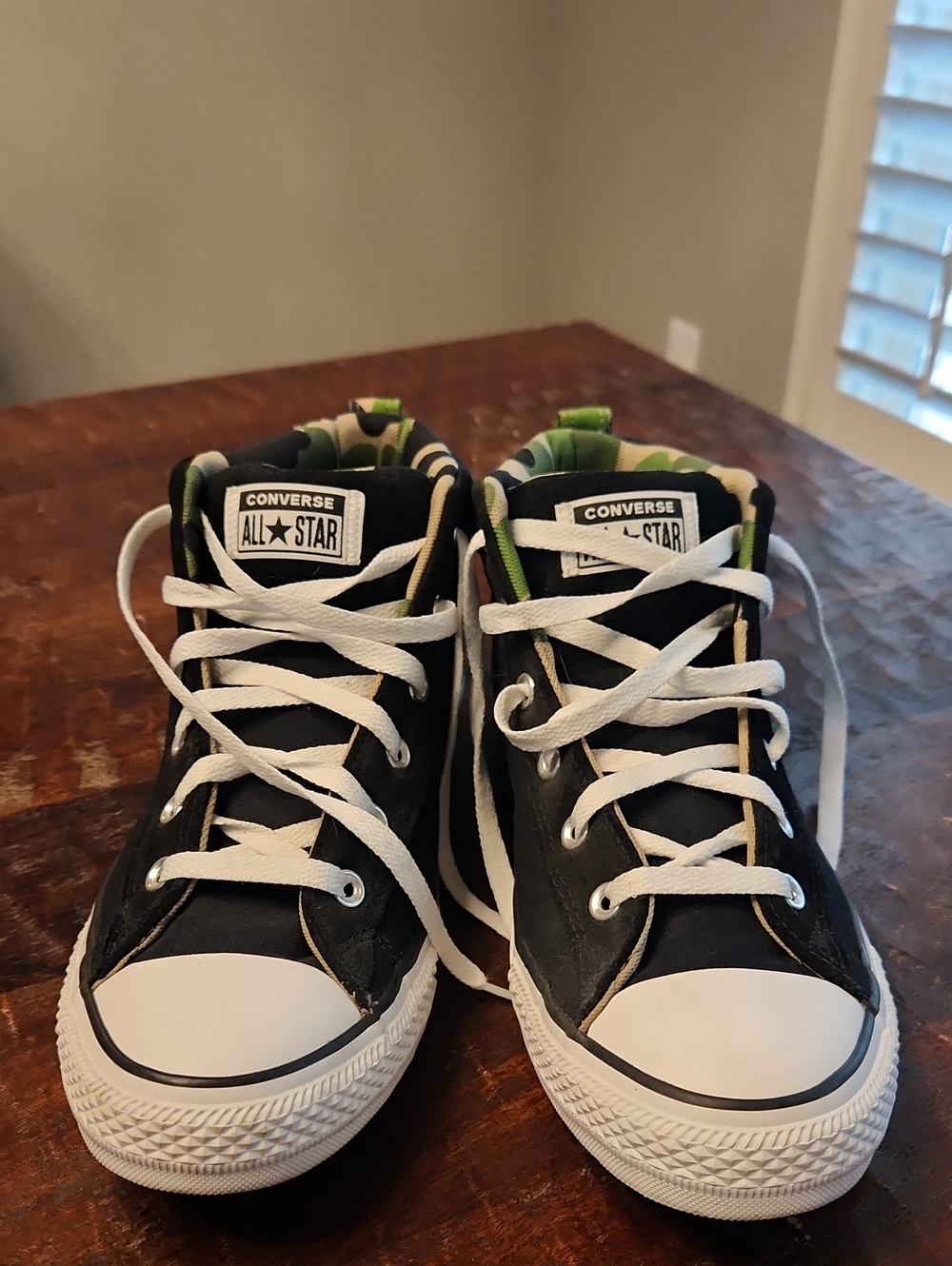 Converse All Star Men’s Mid Height Sneakers in Black and White